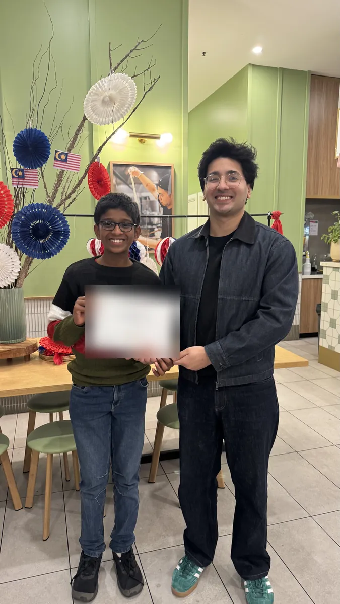 An Aspire student receiving a certificate at the 2026 Selective Entry dinner