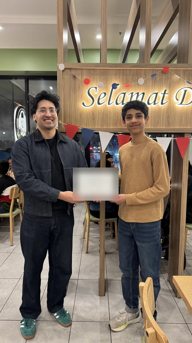 An Aspire student receiving a certificate at the 2026 Selective Entry dinner