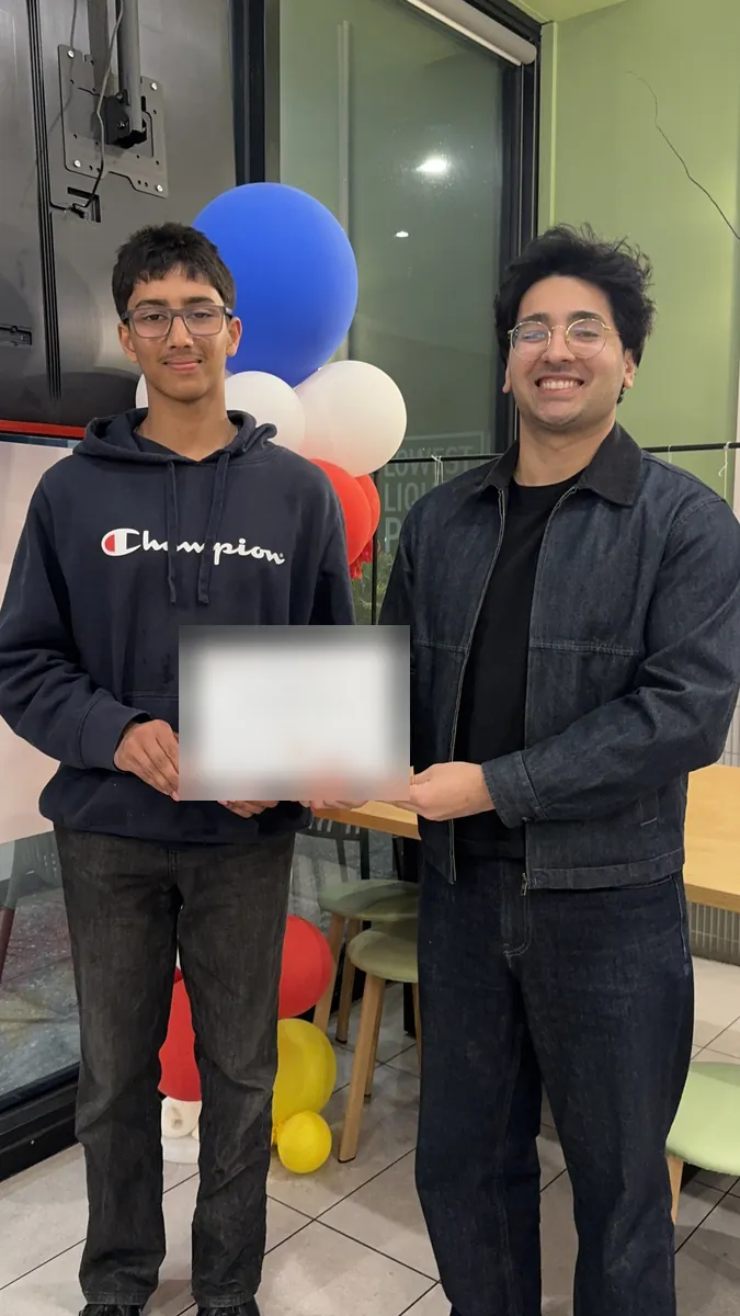 An Aspire student receiving a certificate at the 2026 Selective Entry dinner