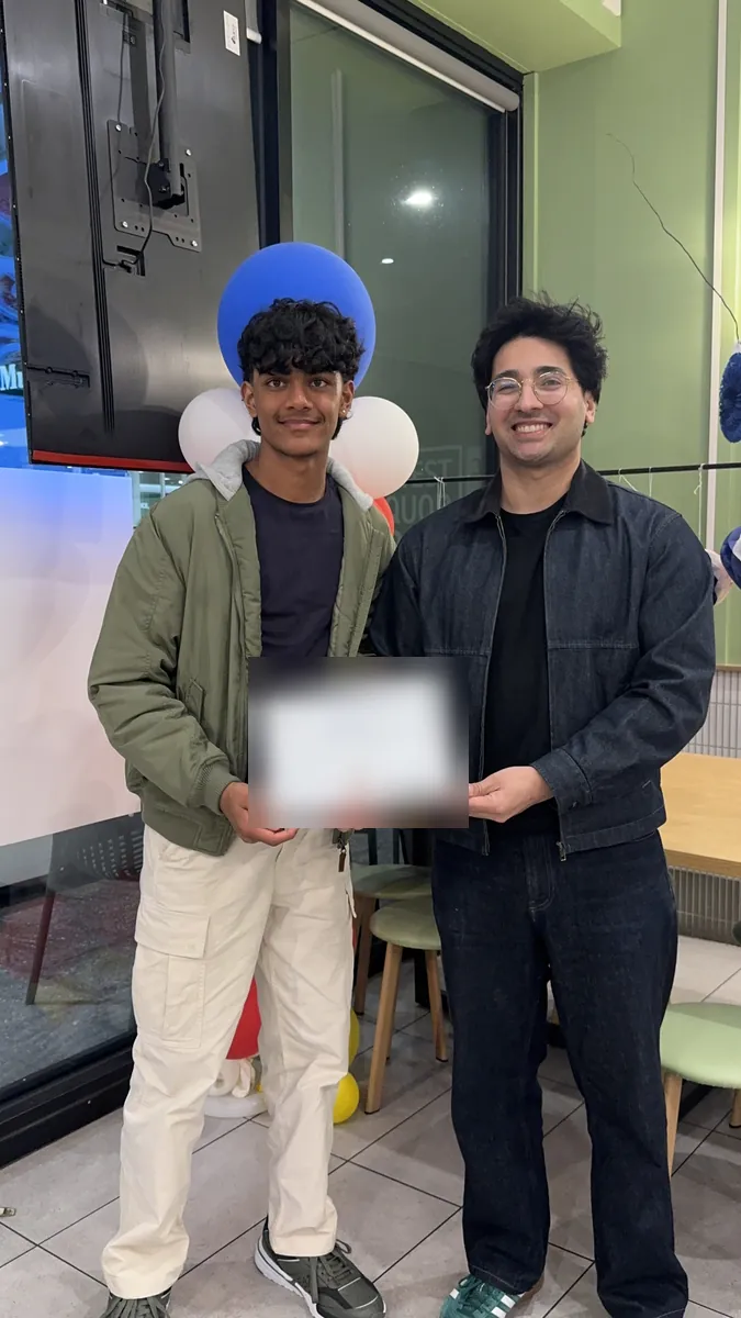 An Aspire student receiving a certificate at the 2026 Selective Entry dinner
