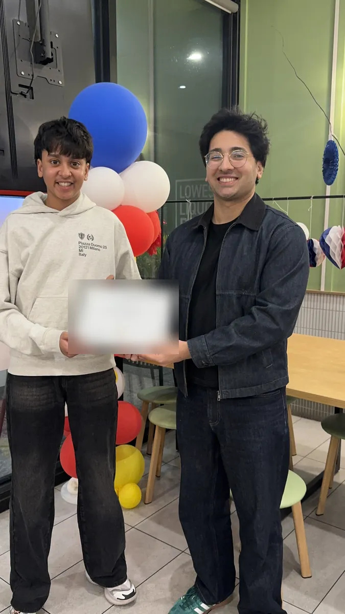 An Aspire student receiving a certificate at the 2026 Selective Entry dinner