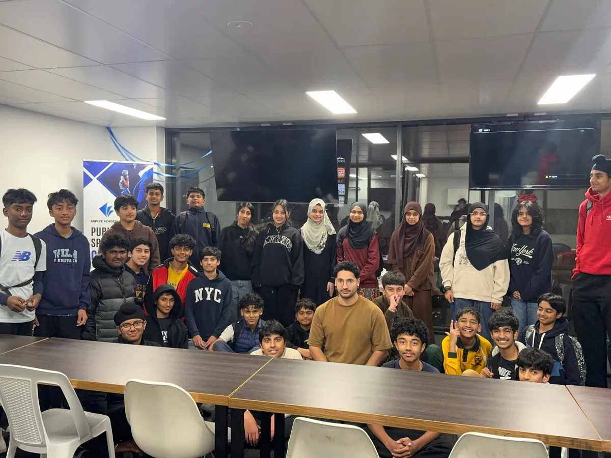 A Selective Entry class gathered with their tutor in a classroom at the Aspire Truganina centre